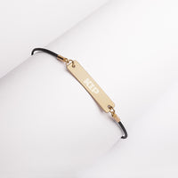 KIP Engraved Silver Bar String Bracelet